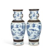 A LARGE PAIR OF CHINESE CRACKLE-GLAZED BLUE AND WHITE 'DRAGON' VASES, LATE QING DYNASTY