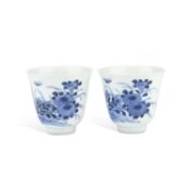 A PAIR OF CHINESE BLUE AND WHITE WINE CUPS