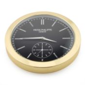 AN ADVERTISING WALL CLOCK SIGNED PATEK PHILIPPE, GENEVE