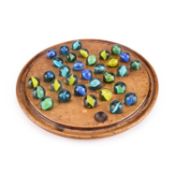 A VICTORIAN WALNUT SOLITAIRE BOARD