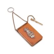 A LATE 19TH CENTURY NOTEBOOK AND PROPELLING PENCIL