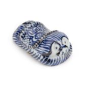 A CHINESE BLUE AND WHITE SCROLL WEIGHT