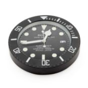 AN ADVERTISING WALL CLOCK SIGNED ROLEX OYSTER PERPETUAL DATE