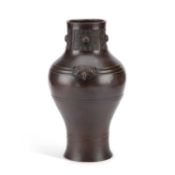 A CHINESE BRONZE VASE IN THE ARCHAIC TASTE