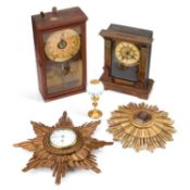 A FRENCH GILTWOOD SUNBURST CARTEL CLOCK