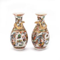 A PAIR OF CHINESE FAMILLE ROSE VASES