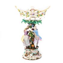 A LARGE MEISSEN FLOWER-ENCRUSTED FIGURAL CENTREPIECE, CIRCA 1870