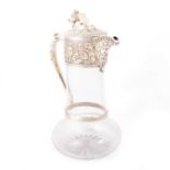 A VICTORIAN SILVER-MOUNTED CLARET JUG