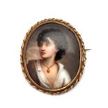 A DRESDEN PORCELAIN PORTRAIT PLAQUE BROOCH, CIRCA 1880