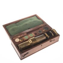 A VICTORIAN MAHOGANY-CASED BRASS FIELD MICROSCOPE