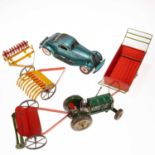 A GROUP OF TIN PLATE TOYS