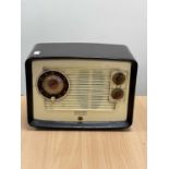 A VINTAGE EKCO A222 BAKELITE CLOCK RADIO