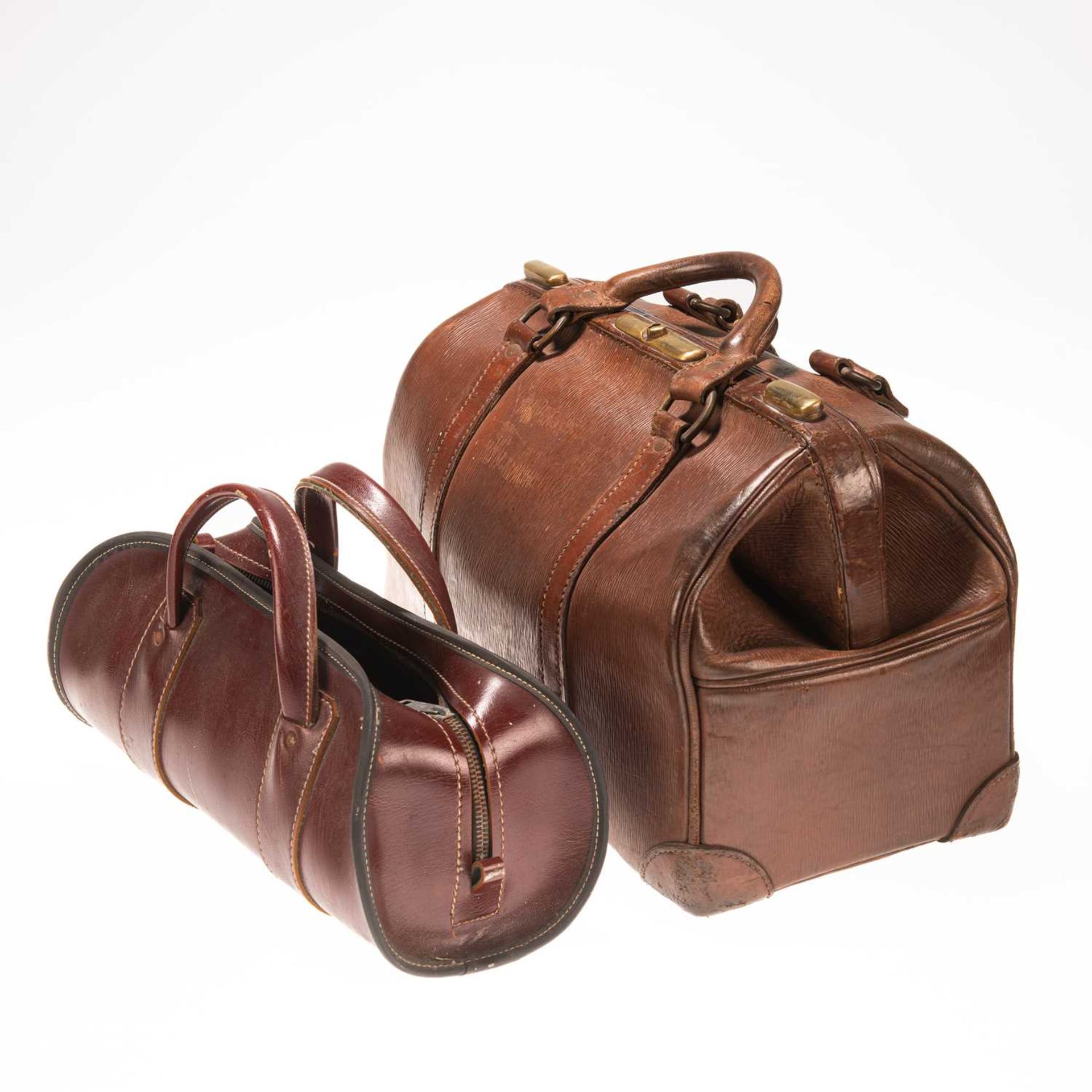 A SET OF VINTAGE BOULES IN LEATHER CASE