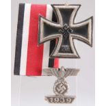 A GERMAN 2ND CLASS IRON CROSS AND BAR