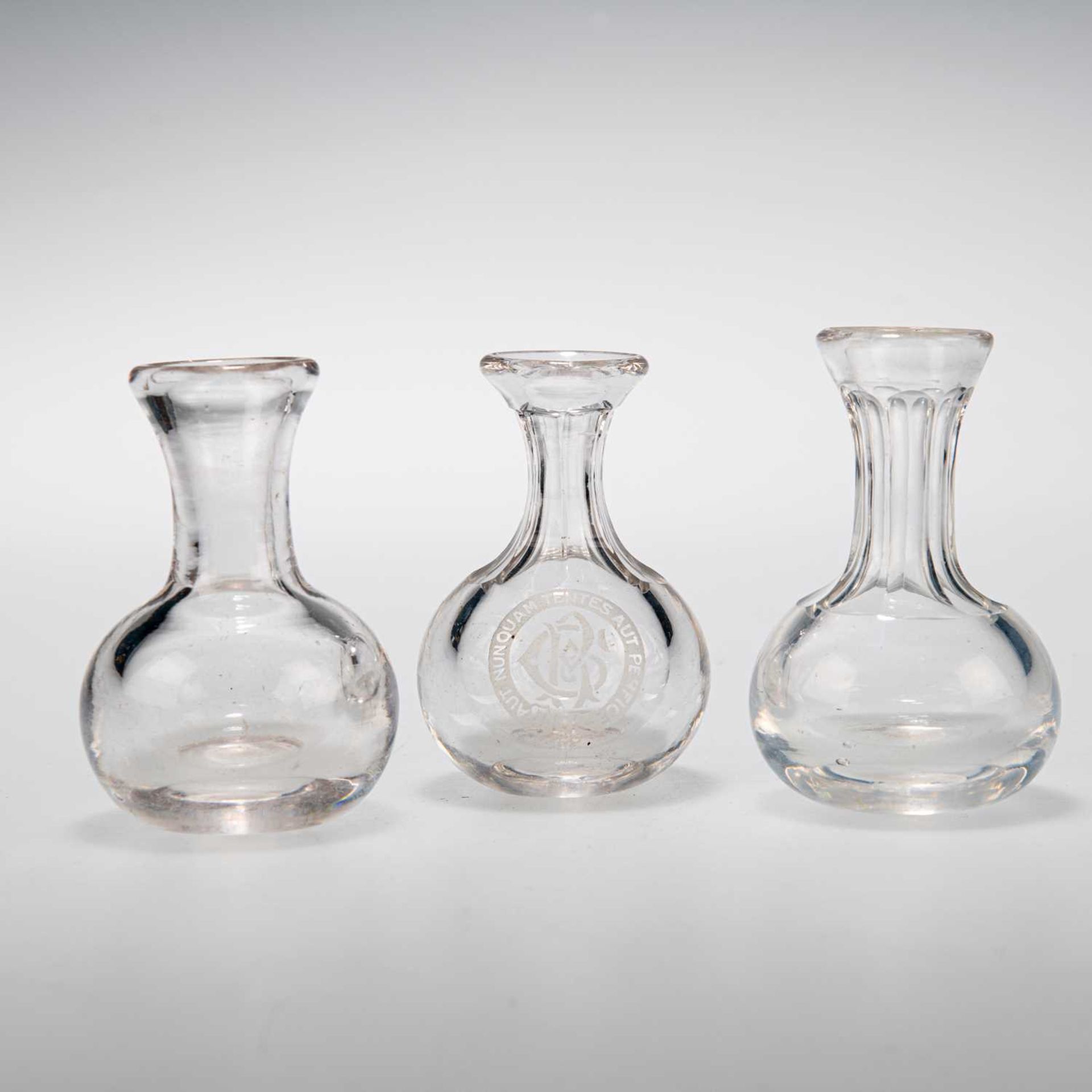 A RARE SET OF THREE 19TH CENTURY GLASS GLOBE SPIRIT MEASURES