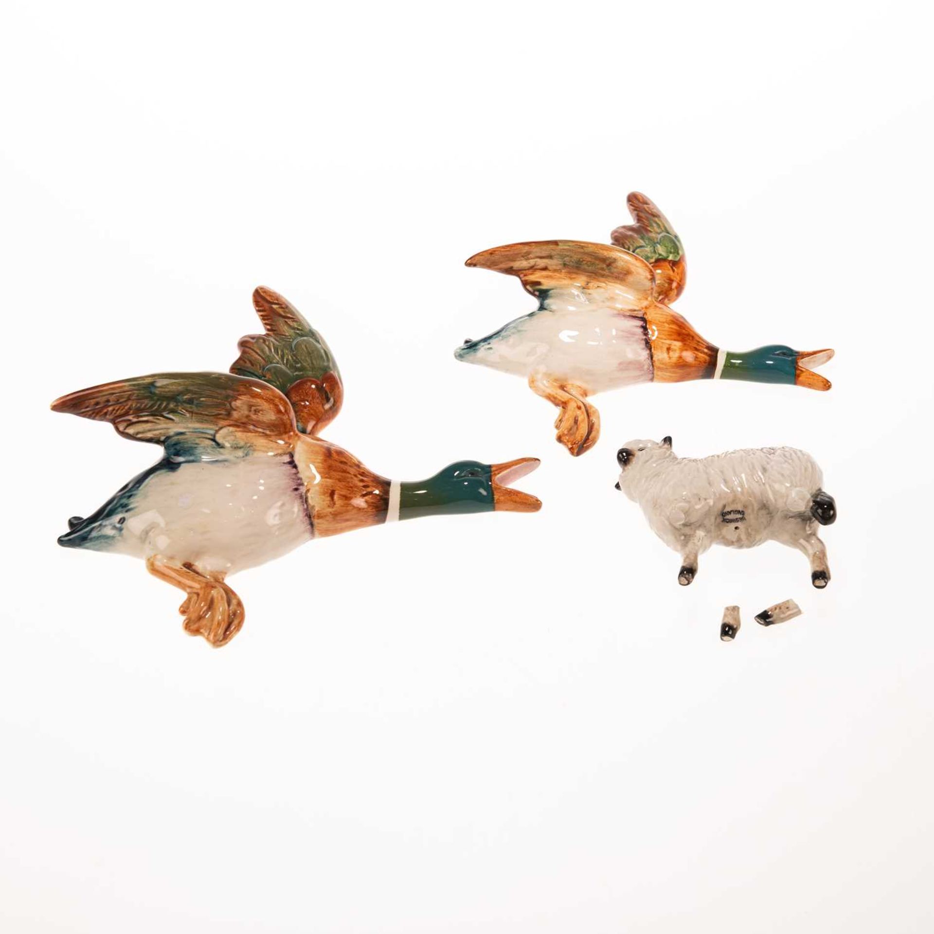 A PAIR OF BESWICK CHINA MALLARD WALL PLAQUES