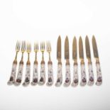 SIX PAIRS OF SILVER-GILT AND PORCELAIN-HANDLED FRUIT KNIVES AND FORKS