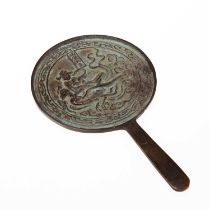 A CHINESE BRONZE MIRROR, POSSIBLY LIAO DYNASTY