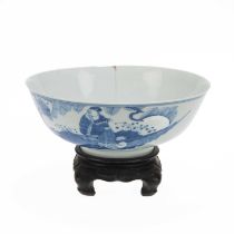 A CHINESE BLUE AND WHITE BOWL ON STAND