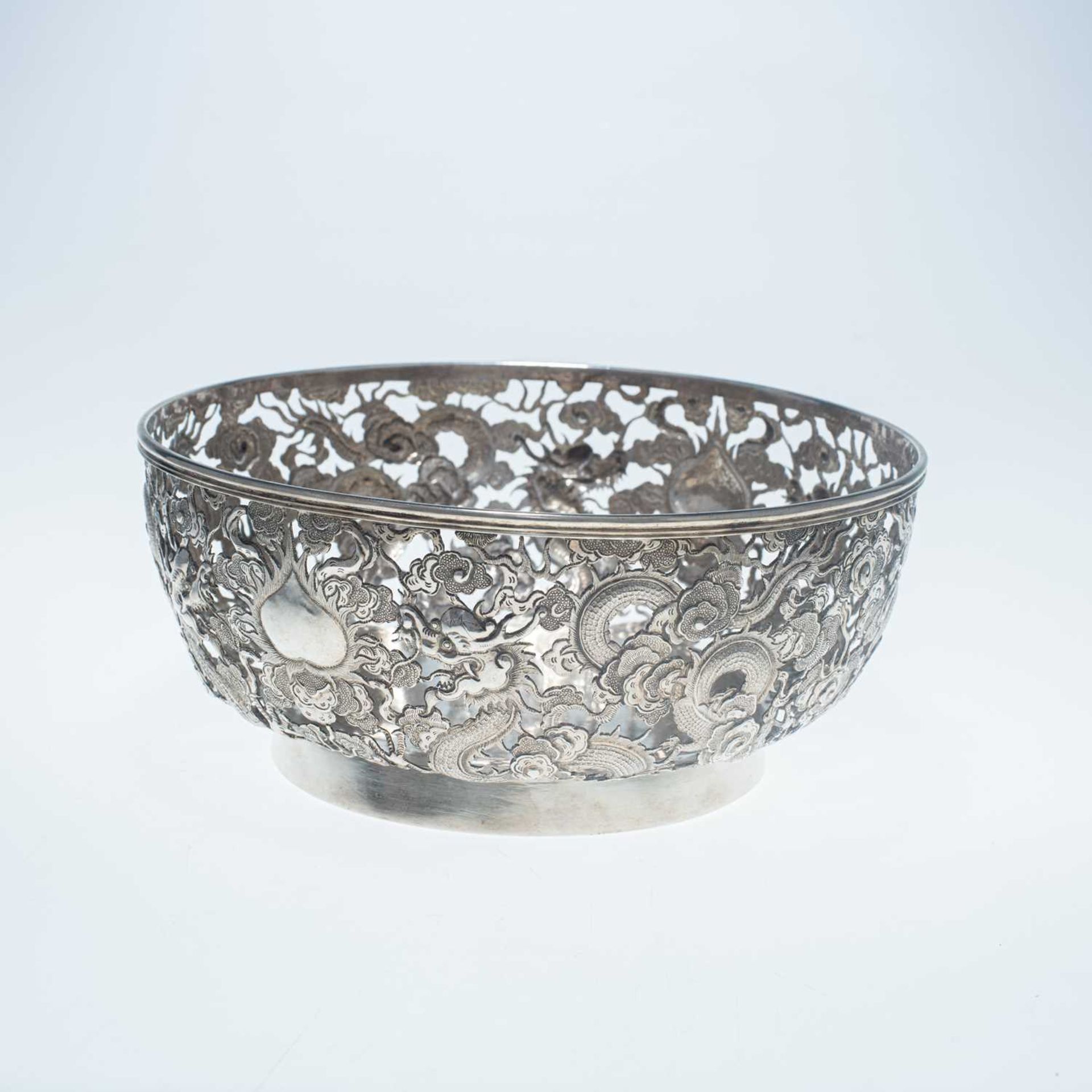 A LARGE CHINESE SILVER PIERCED BOWL