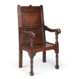 AN 18TH CENTURY OAK WAINSCOT CHAIR