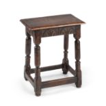 A CHARLES II OAK JOINED STOOL