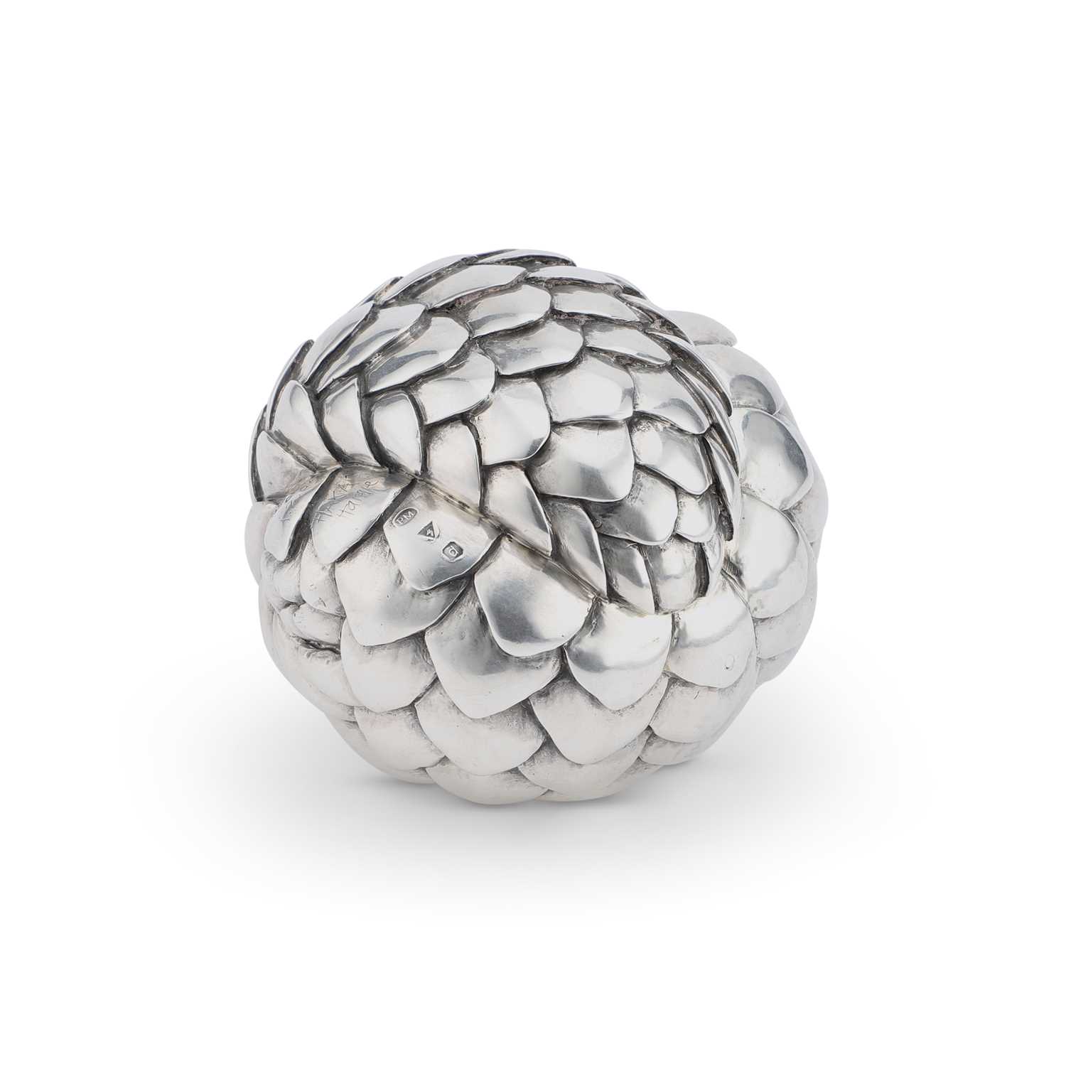 PATRICK MAVROS: A LARGE SILVER SCULPTURE OF A PANGOLIN ROLLED