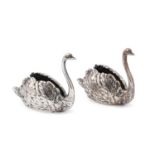 A PAIR OF ELIZABETH II CAST SILVER SWANS