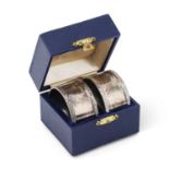 A PAIR OF ART DECO SILVER NAPKIN RINGS