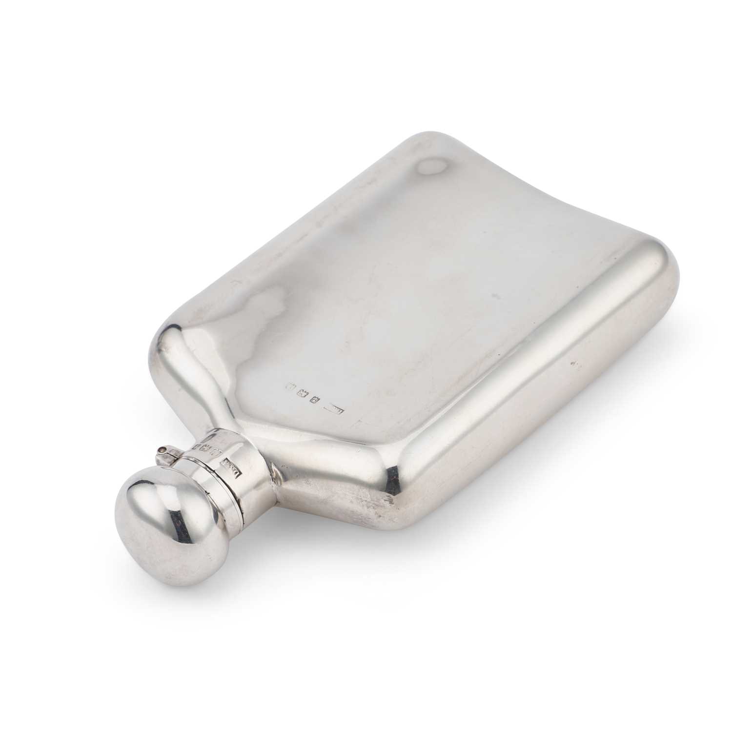 AN EDWARDIAN SILVER HIP FLASK