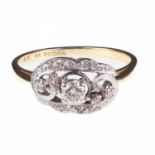 AN 18 CARAT GOLD DIAMOND DRESS RING