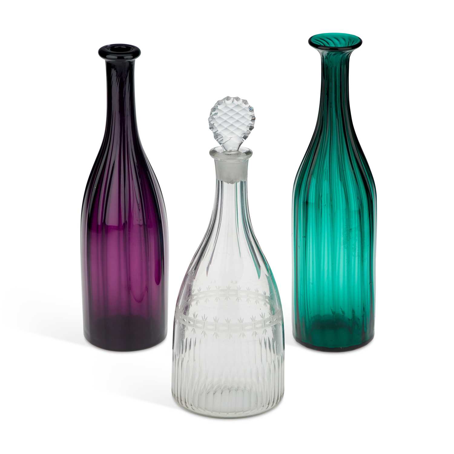 TWO COLOURED GLASS FLUTED SPIRIT DECANTERS, CIRCA 1830