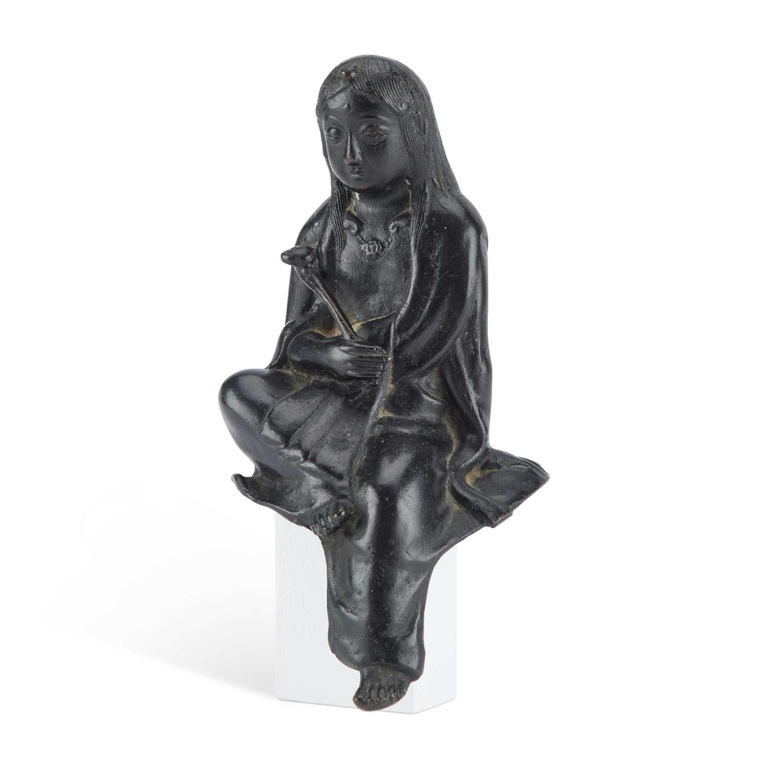 AN ORIENTAL BRONZE FIGURE OF A SEATED DEITY