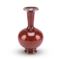 A CHINESE SANG-DE-BOEUF VASE