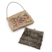 A SILVER-PLATED MESH EVENING BAG AND A NEEDLEWORK EVENING BAG