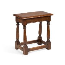 A 17TH CENTURY STYLE OAK JOINT STOOL