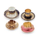 FOUR CABINET CUPS AND SAUCERS