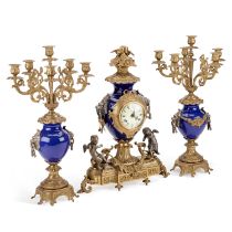 A PERIOD STYLE GILT-METAL MOUNTED CLOCK GARNITURE