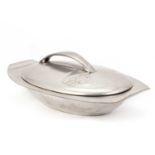 ARCHIBALD KNOX (1864-1933) FOR LIBERTY & CO, A TUDRIC PEWTER MUFFIN DISH