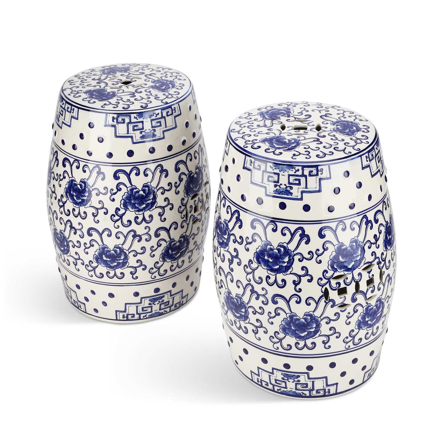 A PAIR OF BLUE AND WHITE POTTERY GARDEN SEATS IN THE CHINESE TASTE