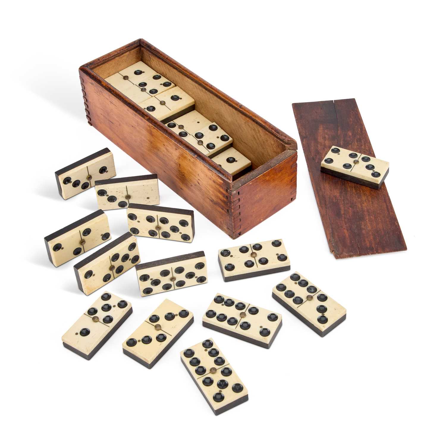 A BOXED SET OF LATE 19TH CENTURY EBONY AND BONE DOMINOES