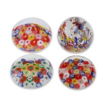 FOUR GLASS PAPERWEIGHTS