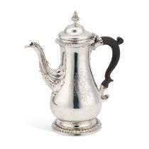 AN EARLY GEORGE III SILVER COFFEE POT