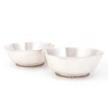 SIGVARD BERNADOTTE FOR GEORG JENSEN: A PAIR OF DANISH SILVER BOWLS