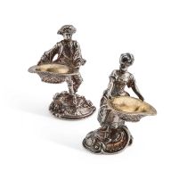 A PAIR OF 19TH CENTURY CONTINENTAL SILVER-PLATED CAST FIGURAL SALTS