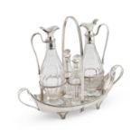 A GEORGE III SILVER FOUR-BOTTLE CRUET FRAME