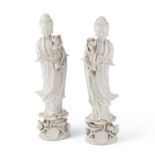 A LARGE PAIR OF CHINESE BLANC-DE-CHINE FIGURES OF GUANYIN