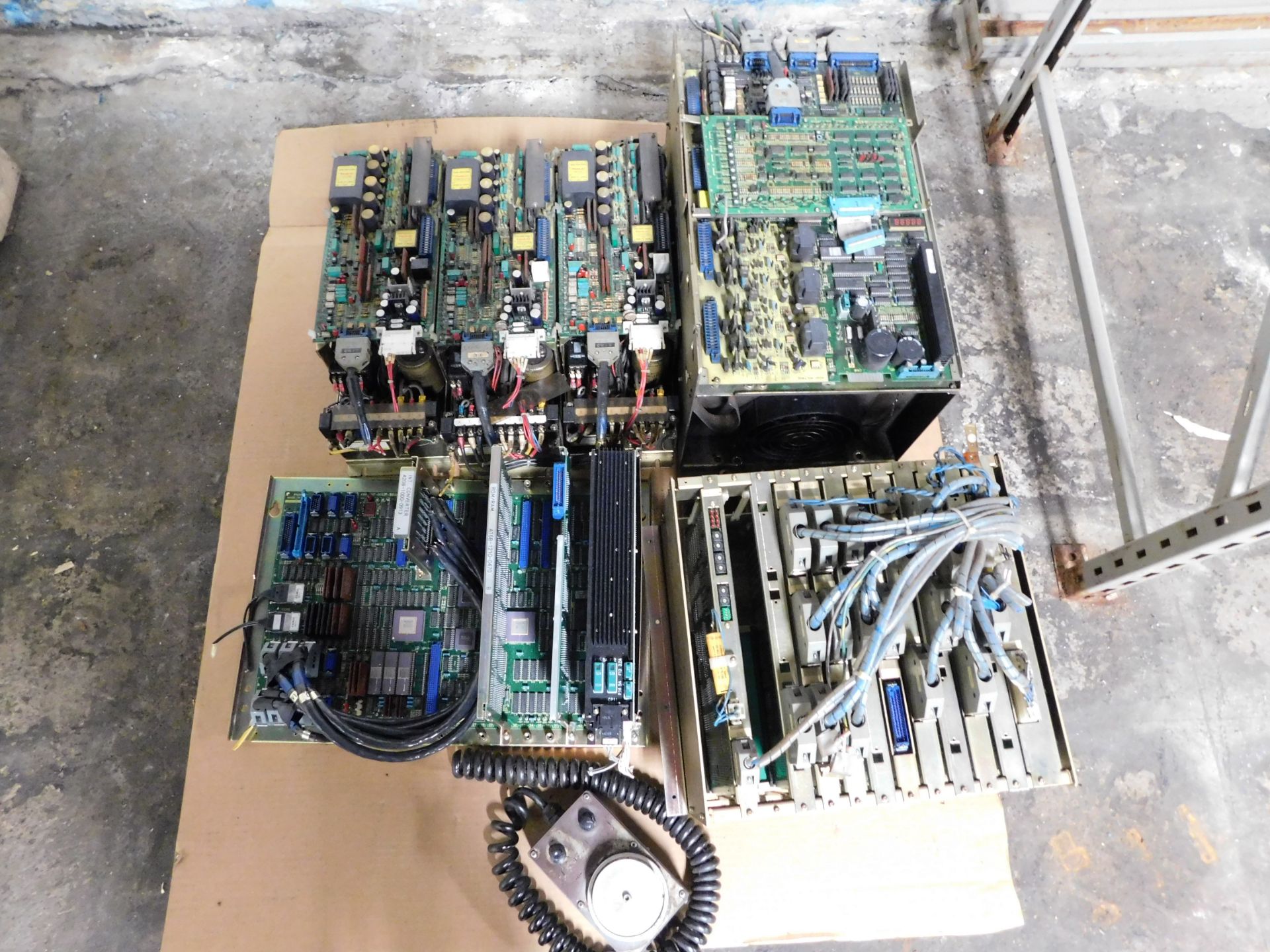 LOT OF MISCELLANEOUS DRIVES AND CPU BOARDS. FANUC