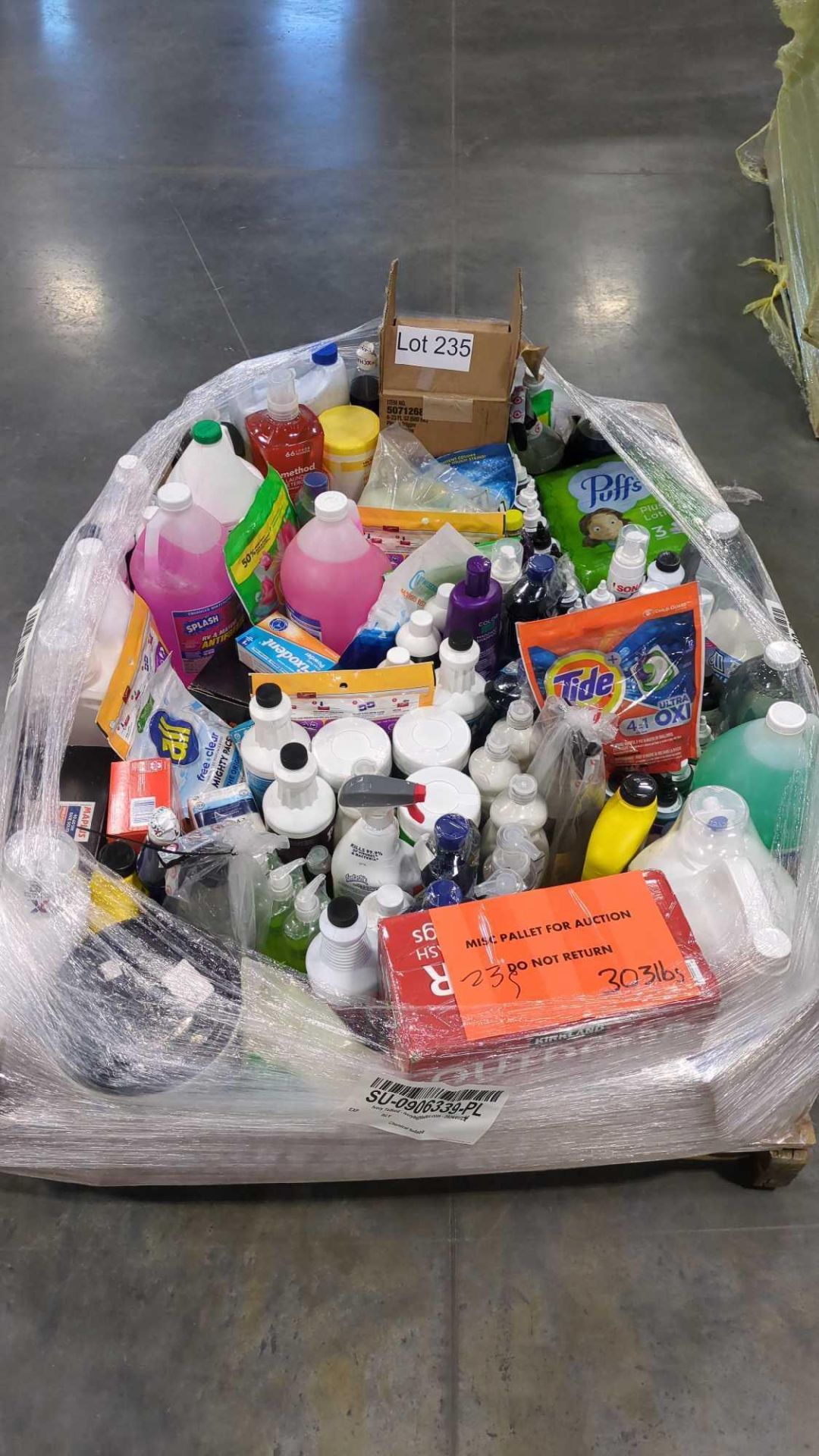 pallet of cleaning supplies, garbage bags, soaps, detergent and more
