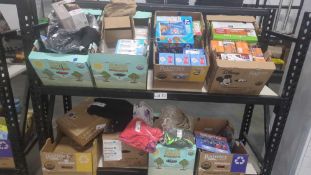 Rolling Rack: Big box store items: leaf edelweiss vacuum, candy bars, pretzels, Chex mix, Air heads,